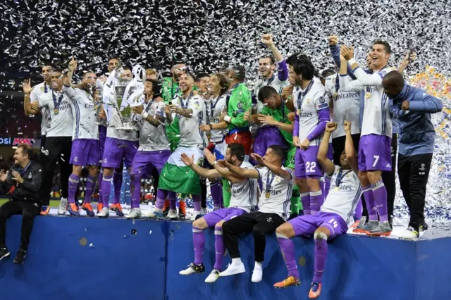 Sergio Ramos of Real Madrid lifts The Champions League trophy