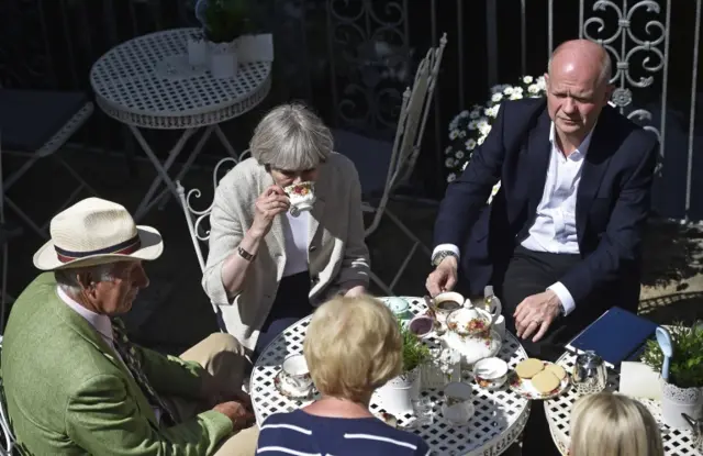 Theresa May and William Hague drink tea in Silkstone, South Yorkshire