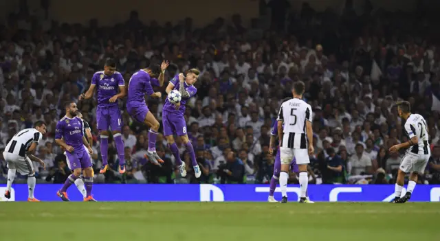 Paulo Dybala of Juventus takes a free kick