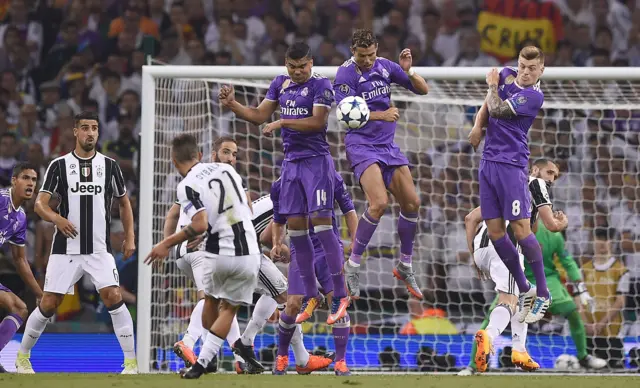 Paulo Dybala of Juventus takes a free kick