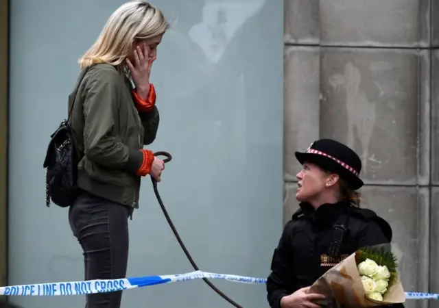 Woman and police officer