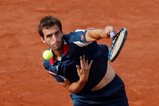 Albert Ramos-Vinolas serves