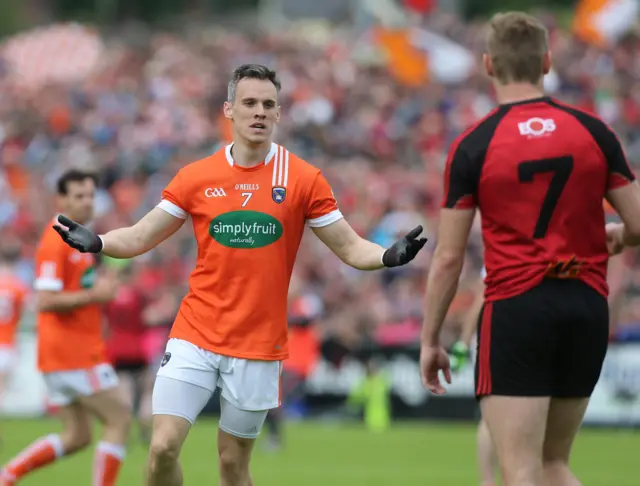 Mark Shields celebrates his first-half goal for Armagh