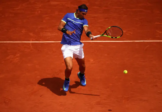 Rafael Nadal of Spain plays a forehand