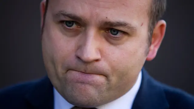 British Labour Party member of parliament (MP) Neil Coyle speaks to the media outside his constituency office in London on December 4, 2015.