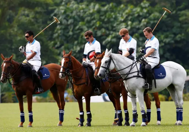 Prince Harry and his teammates observed a minute's silence for victims of the attack ahead of a polo match in Singapore