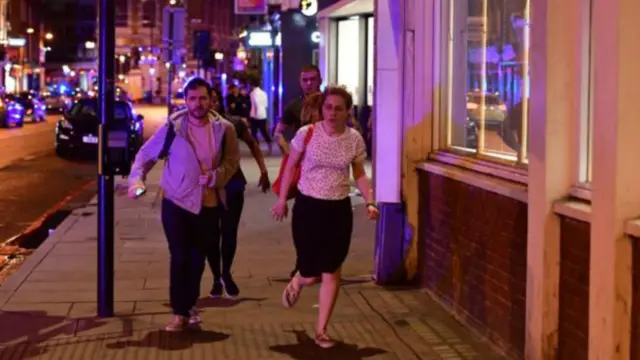 People run down Borough High Street