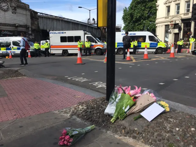 Flowers have been left at the scene