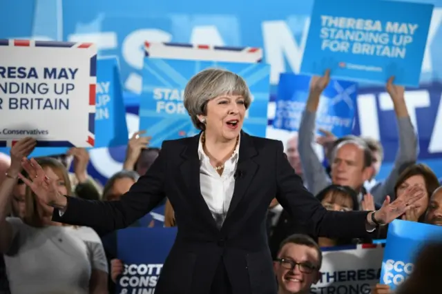 Theresa May delivers a speech at Clockwork Removals in Edinburgh