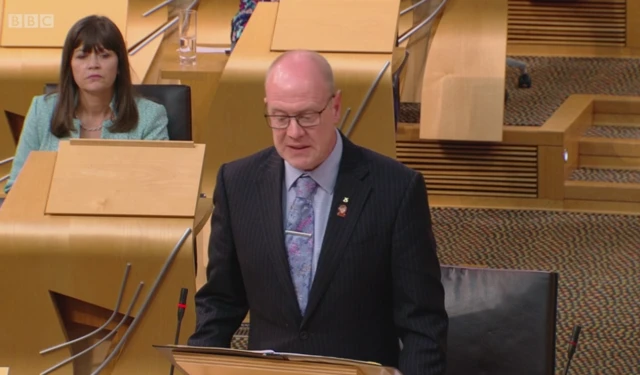 Housing Minister Kevin Stewart