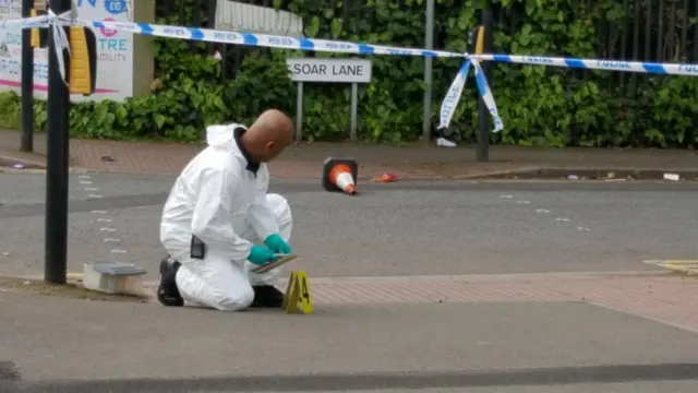 Police forensics after a stabbing in Leicester