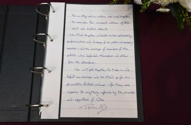 Photo of Theresa May's signature in book of condolence