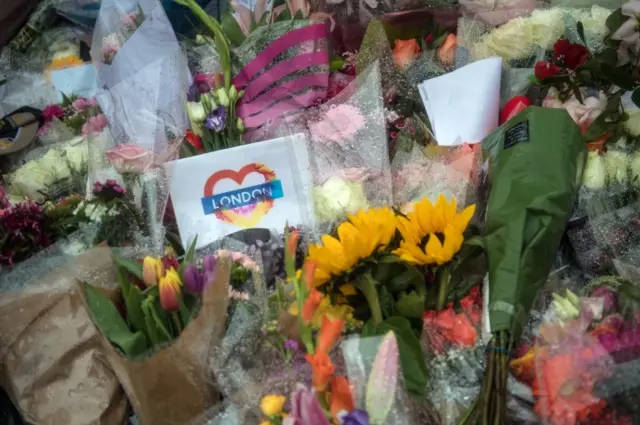 Flowers and tributes are left near the scene of Saturday"s terrorist attack, on June 6, 2017 in London, England