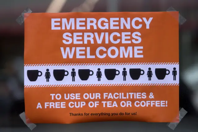 poster is displayed advertising free hot drinks for emergency service workers near London Bridge following Saturday"s terrorist attack, on June 6, 2017 in London, England