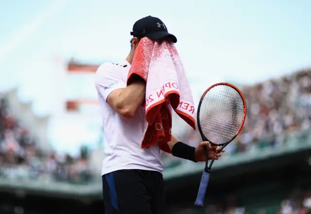 Andy Murray of Great Britain looks dejected