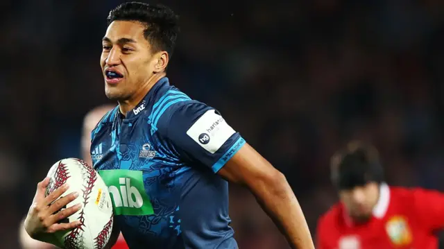 Rieko Ioane runs with the ball