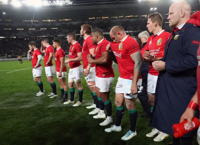 British and Irish Lions players stand dejected after the tour match