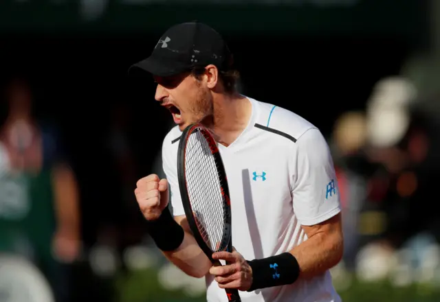 Andy Murray celebrates winning his quarter final