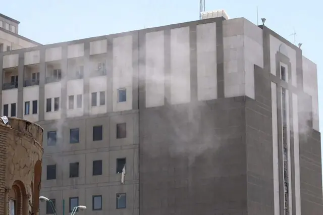 Smoke rise from the Iranian parliament building during an attack in Tehran, Iran, 7 June 2017.