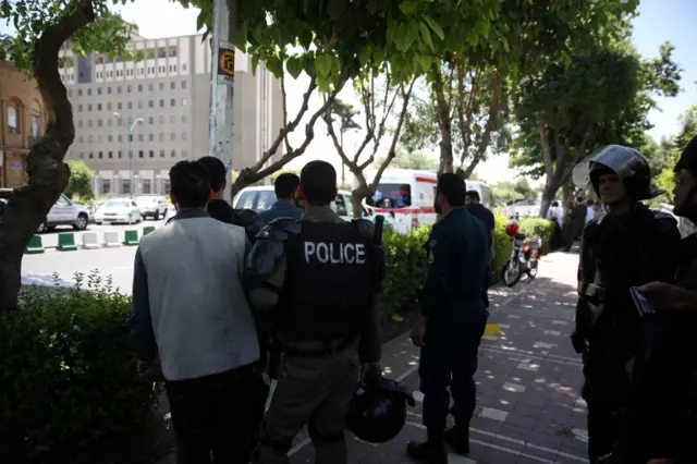 Iranian police stand near the parliament"s building during a gunmen attack in central Tehran, Iran, 7 June 2017.