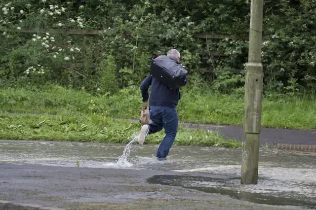 Man runs through deep water