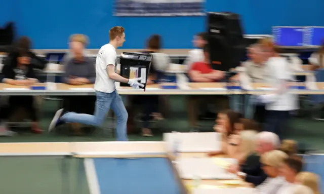 Man running with box