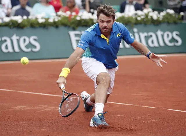 Stanislas Wawrinka plays a backhand