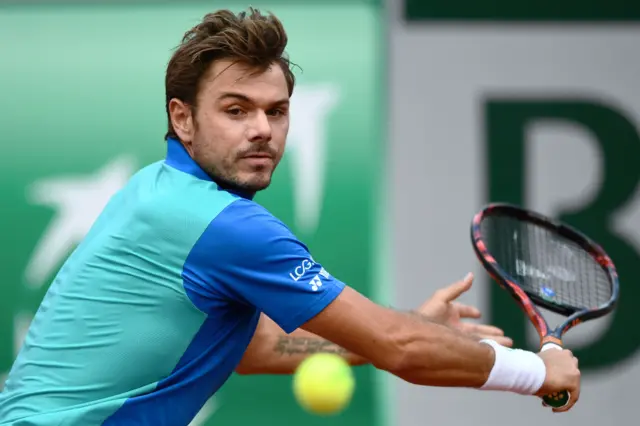 Stanislas Wawrinka returns the ball