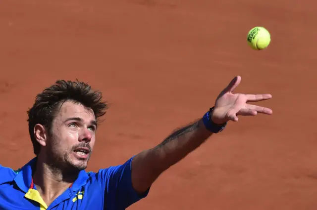 Stanislas Wawrinka serves