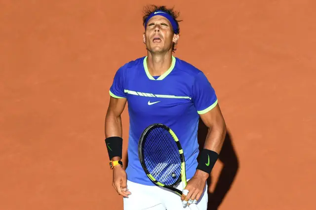 Rafael Nadal reacts