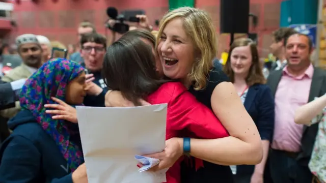 Anna McMorrin is congratulated as she takes the Cardiff North seat