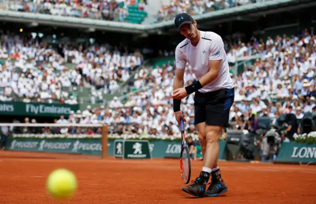 Andy Murray watches on