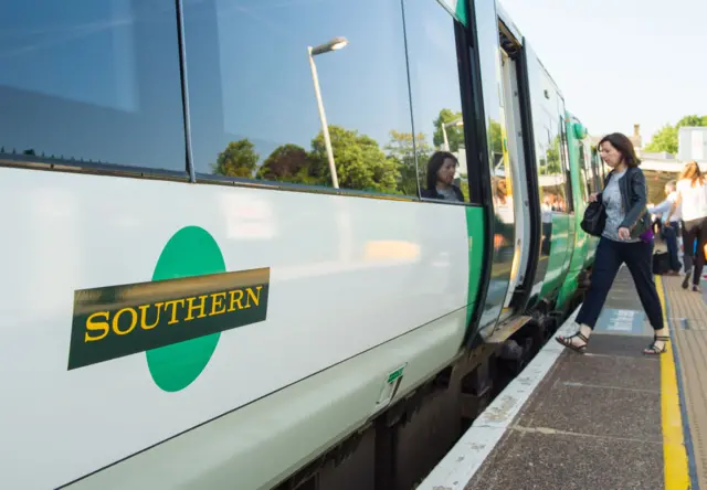 Woman boarding a Southern train