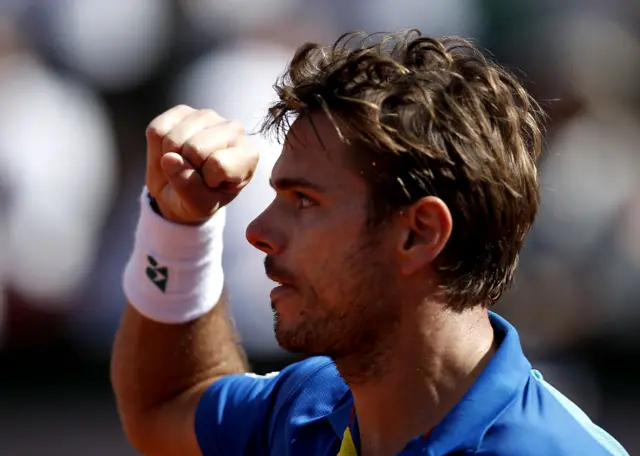 Wawrinka reacts after scoring a point