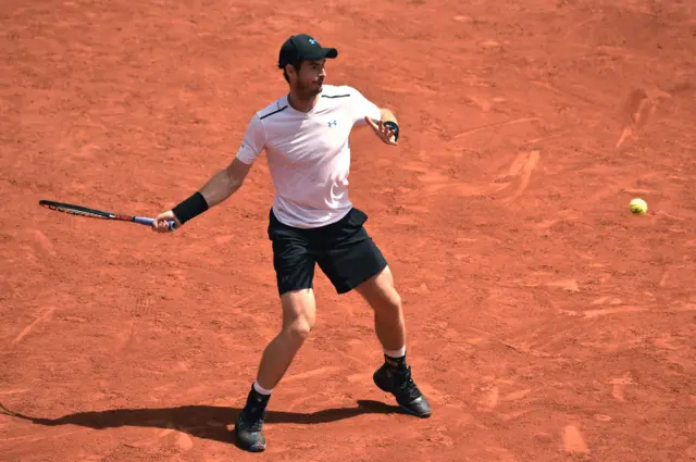 Andy Murray returns the ball