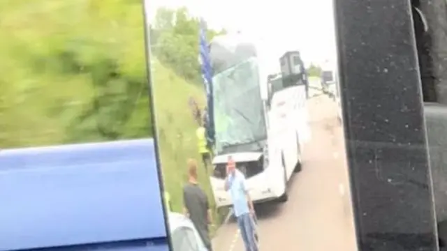 Reflection in mirror of damaged coach