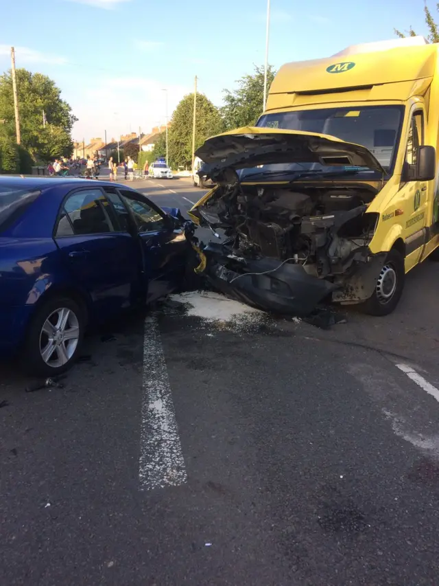 Crash between car and delivery van