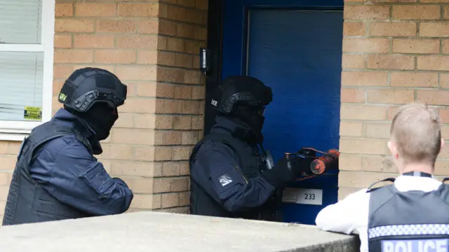 Officers carrying out a raid