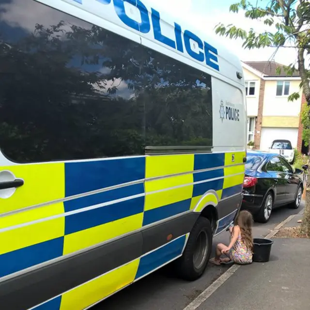 Girl washing van