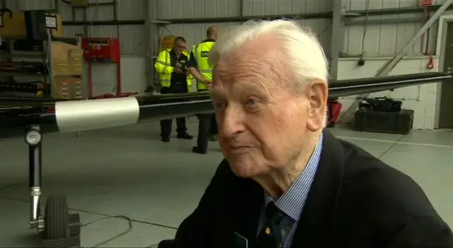 Tom Neil, in air craft hangar