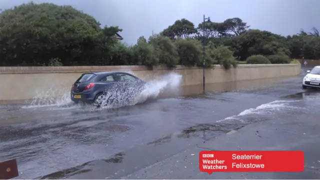 Car driving through flooding in Felixstowe