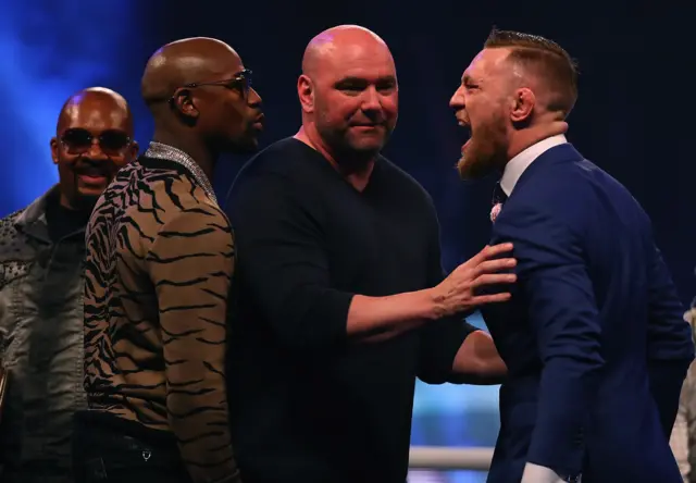 Mayweather and McGregor shouting at each other