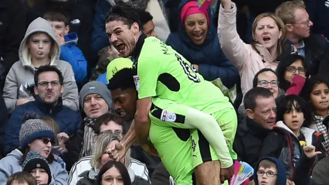 Ben Marshall helps to celebrate an Ivan Cavaleiro goal at Fulham last season