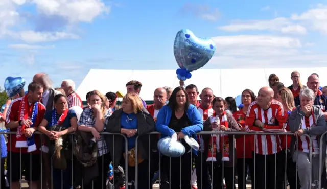 Crowds waiting to pay their respects