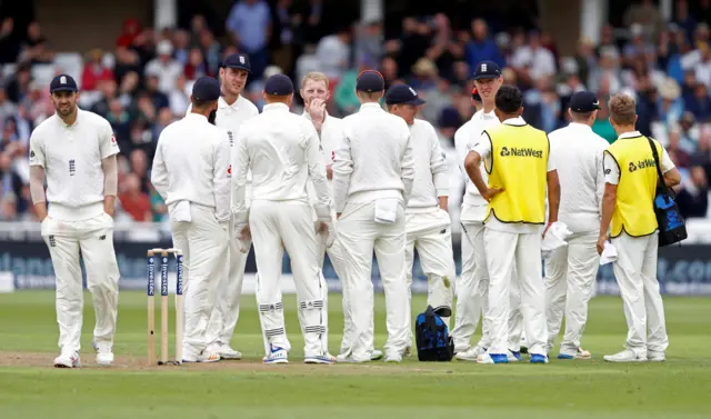 Ben Stokes watches on after reviewing a decision