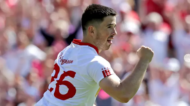 Ronan O'Neill celebrates one of his two Tyrone goals