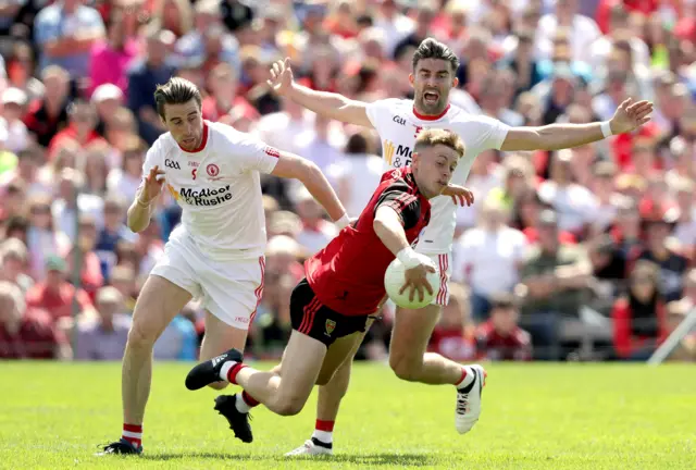 Jerome Johnston with Conall McCann and Tiernan McCann