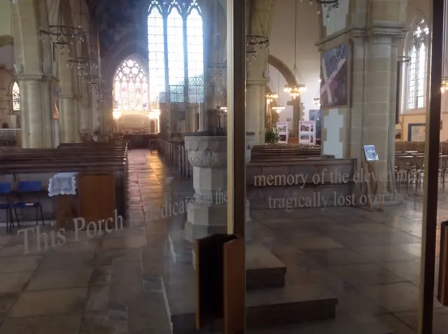 Three-sided glass doorway at minster