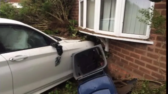 A car crashed into the front of a house in Birmingham