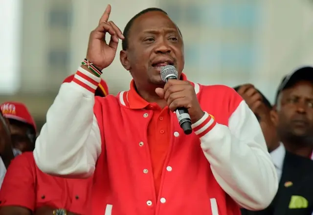 Kenya's President Uhuru Kenyatta (L) of the Jubilee Party addresses his supporters on May 29, 2017 in Nairobi